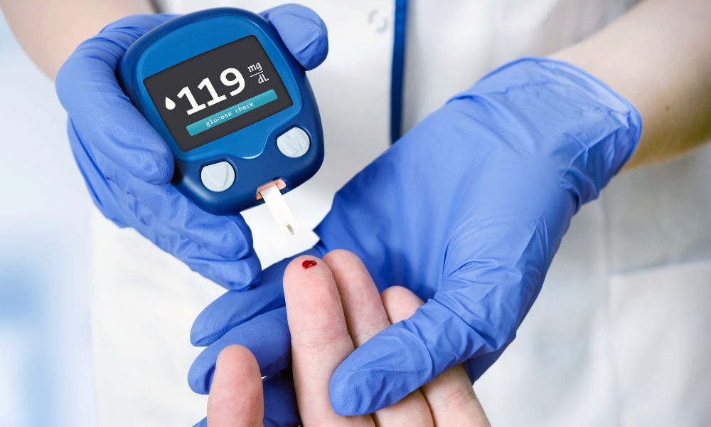 Balanced diabetes-friendly meal, blood glucose monitor, and exercise equipment representing healthy Type 2 diabetes management