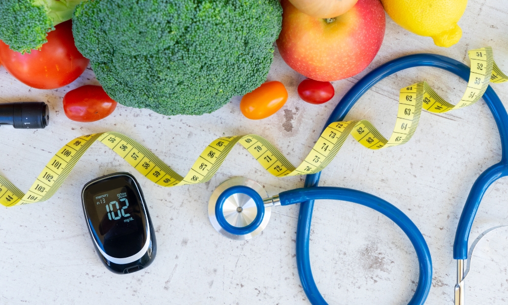 Healthy meal, measuring tape, glucose monitor, and active lifestyle representing medical weight loss for preventing Type 2 diabetes